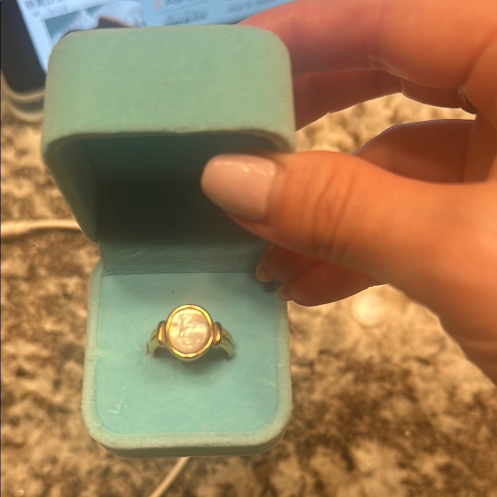 Elegant Gold and White Ring